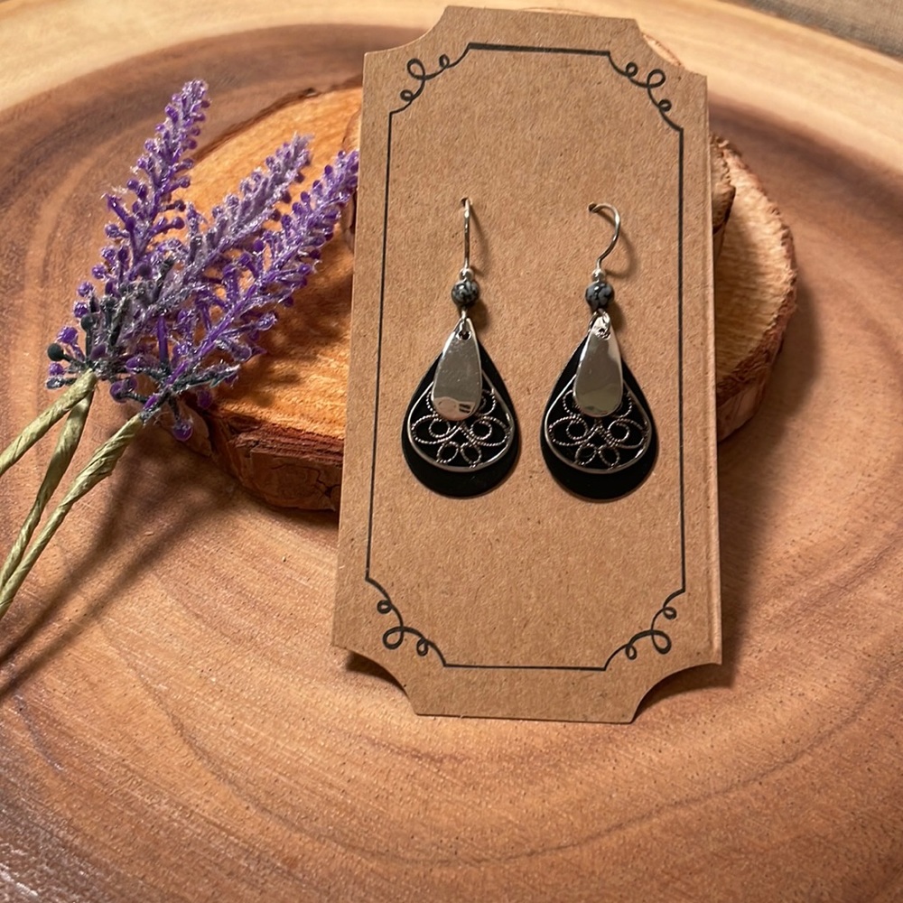 Silver forest black and silver earrings. New, never worn.